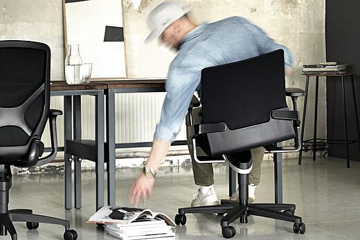 Person at desk showing the functionality of Trimension.